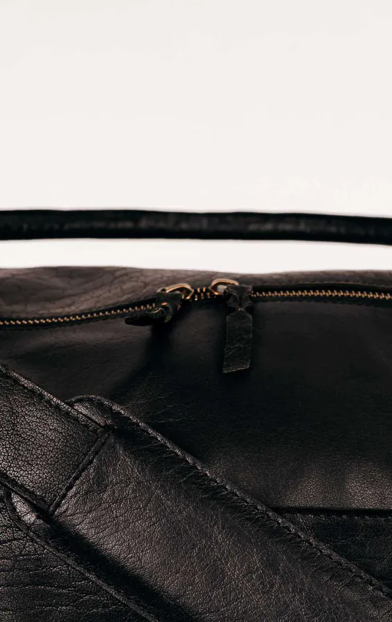 Schwarze Leder Reisetasche - photo 2